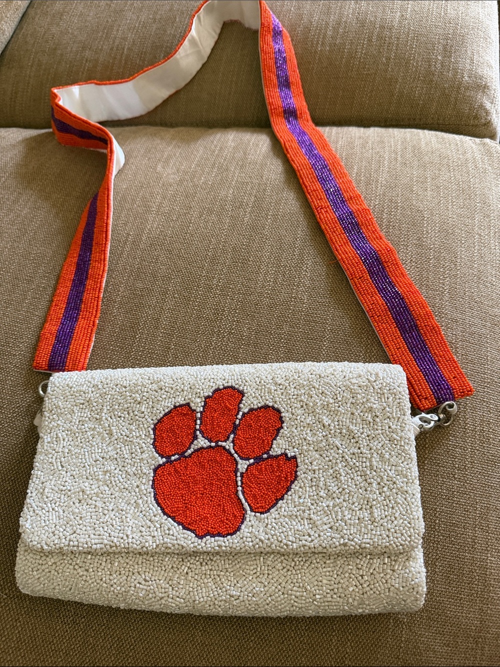 Cream Beaded Crossbody Bag with Orange Paw Accent